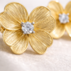 golden bloom floral stud earrings