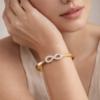 infinity spark gold bracelet