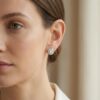 regal emerald halo stud earrings